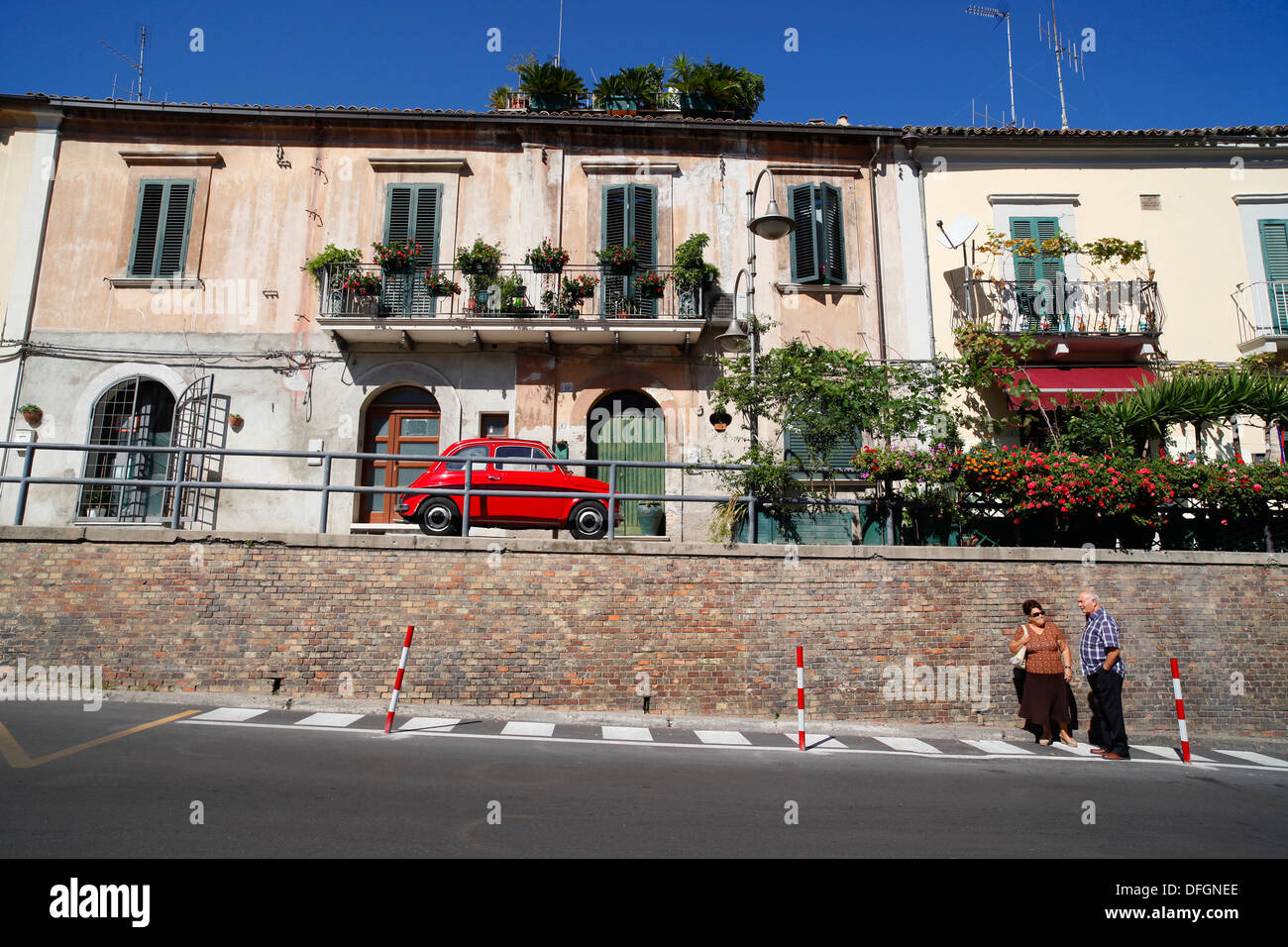 A red Fiat 500 Cinquecento parked in Vasto, Italy. Stock Photo