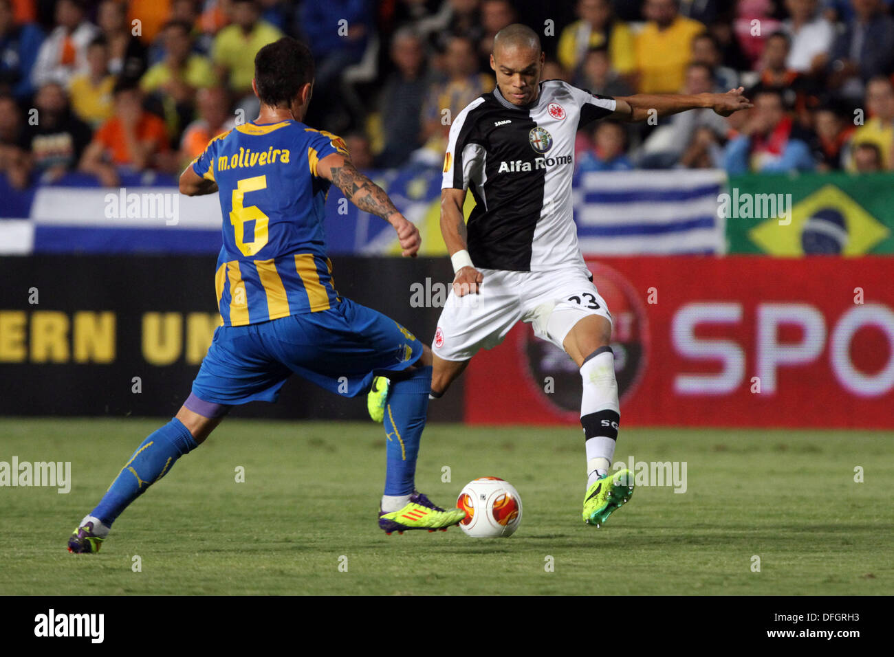 Nicosia, Cyprus. 03rd Oct, 2013. Eintracht Frankfurt's Anderson Bamba  and Apoel's Marcelo Oliveira during thei Europa League group F soccer match at GSP stadium in Nicosia, Cyprus, Thursday, Oct. 3, 2013. © Yiannis Kourtoglou/Alamy Live News Stock Photo