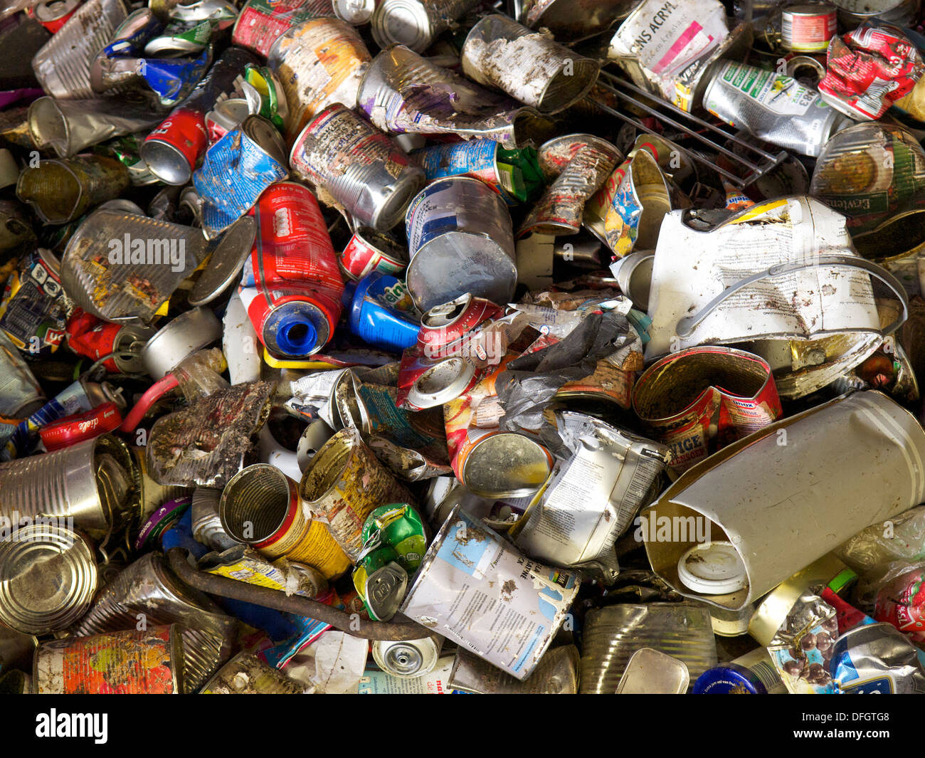 Metal items separated from household waste in recycling plant, ready to