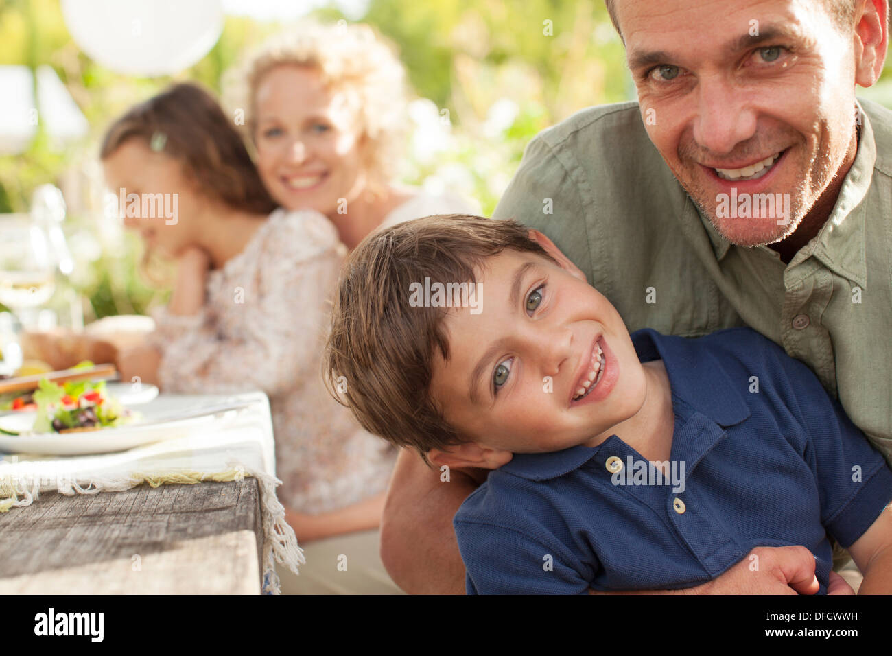 Portrait of smiling father and son Stock Photo