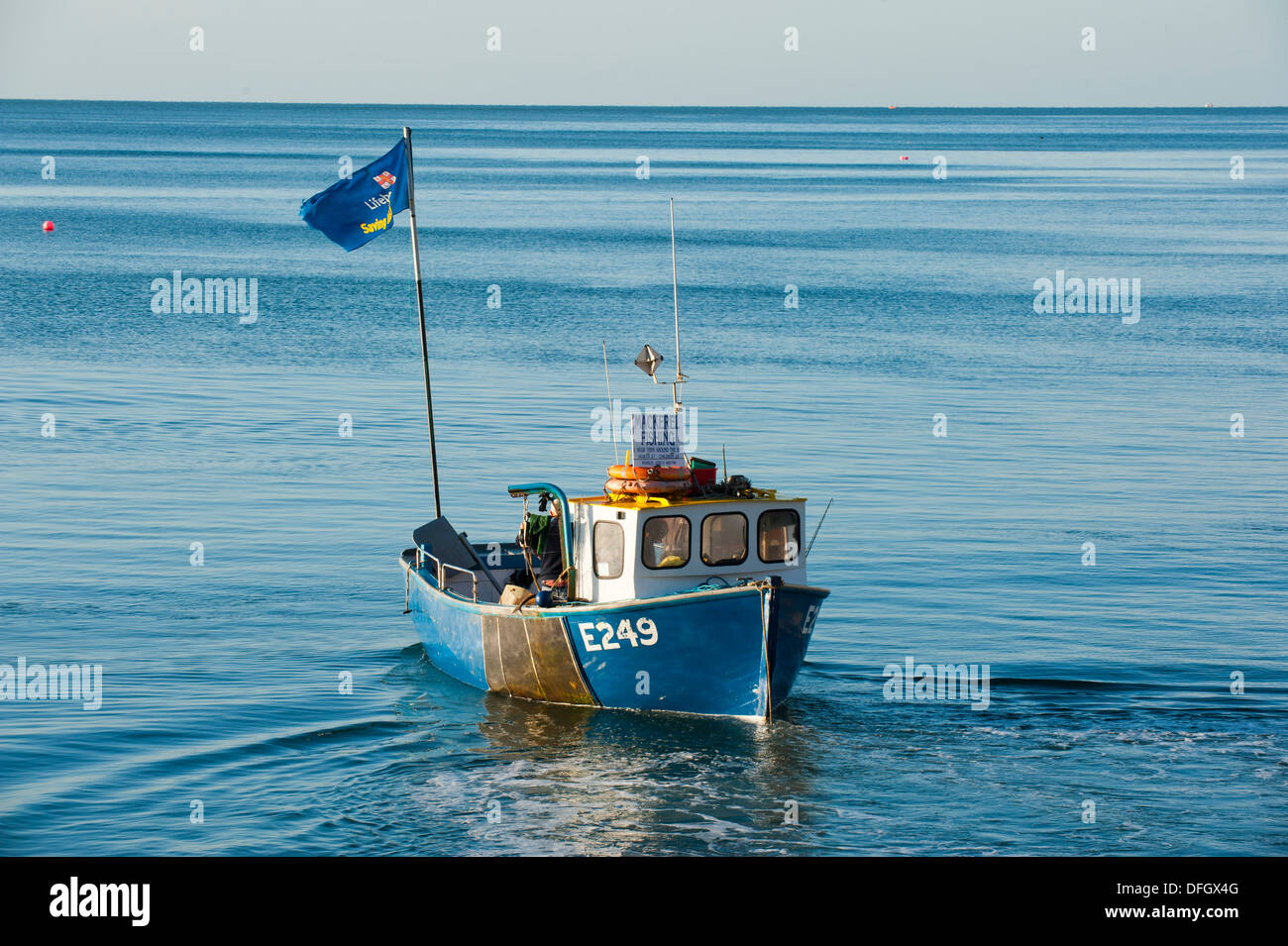 A boat on a fishing trip at Beer, Devon, England. Stock Photo