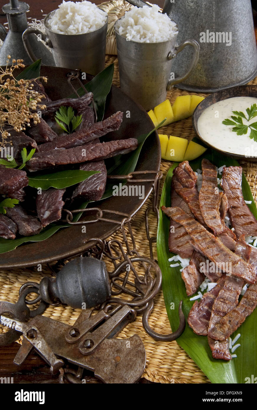Madagascar food, kitoza, zebu dried meat and slices of it grilled