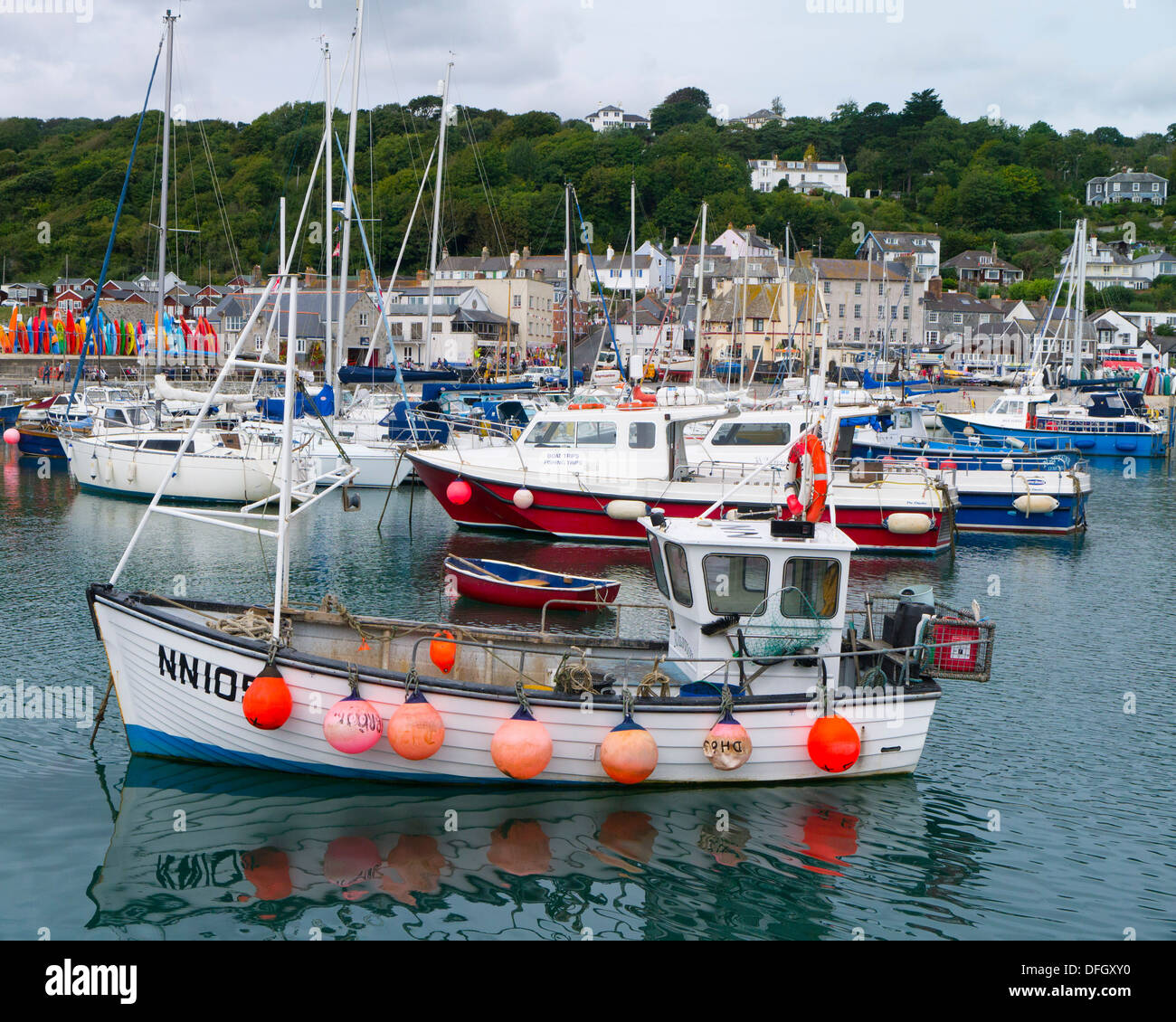 Fishing boats moored at Lyme Regis harbour, Dorset England UK Stock Photo