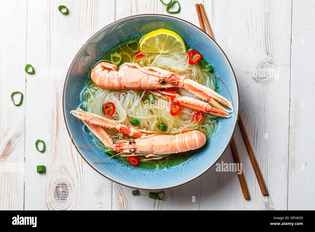 Closeup of Thai soup with scampi and noodles Stock Photo