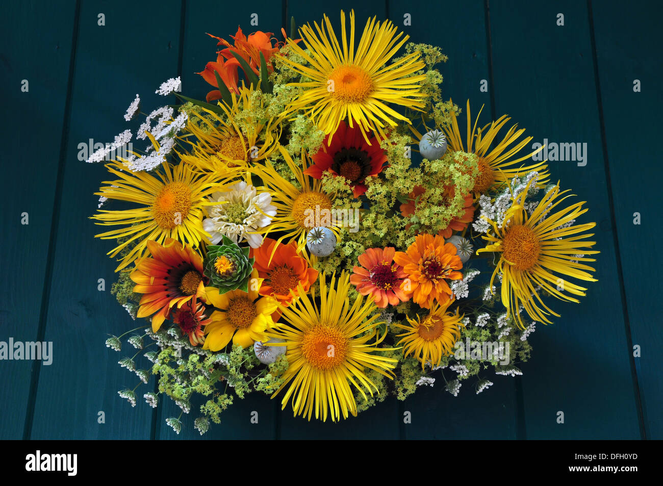 A beautiful orange and yellow cut flower arrangement UK Stock Photo