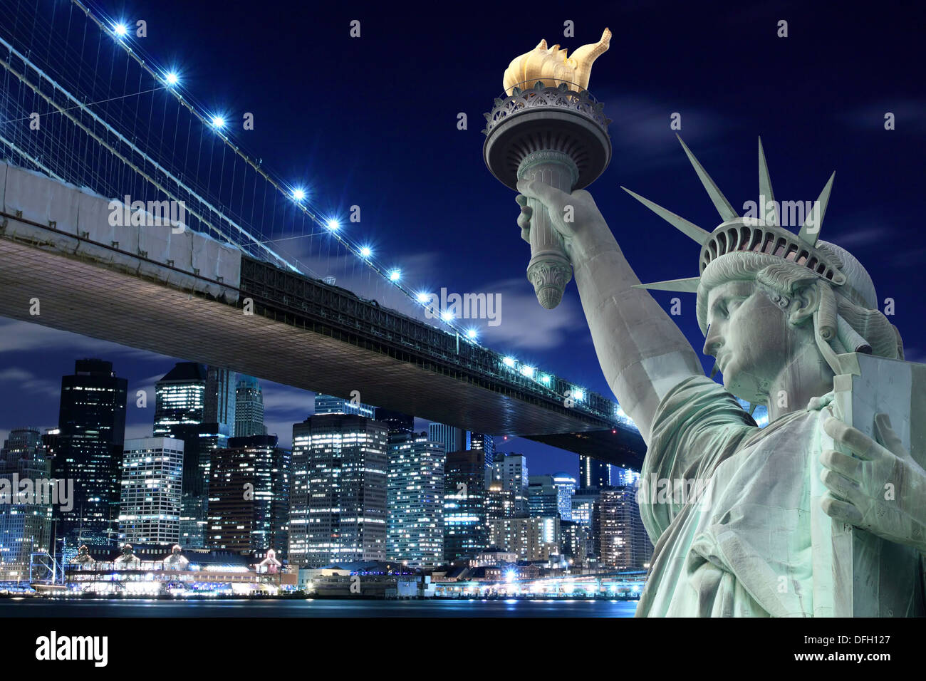 Brooklyn Bridge and The Statue of Liberty at Night, New York City Stock Photo