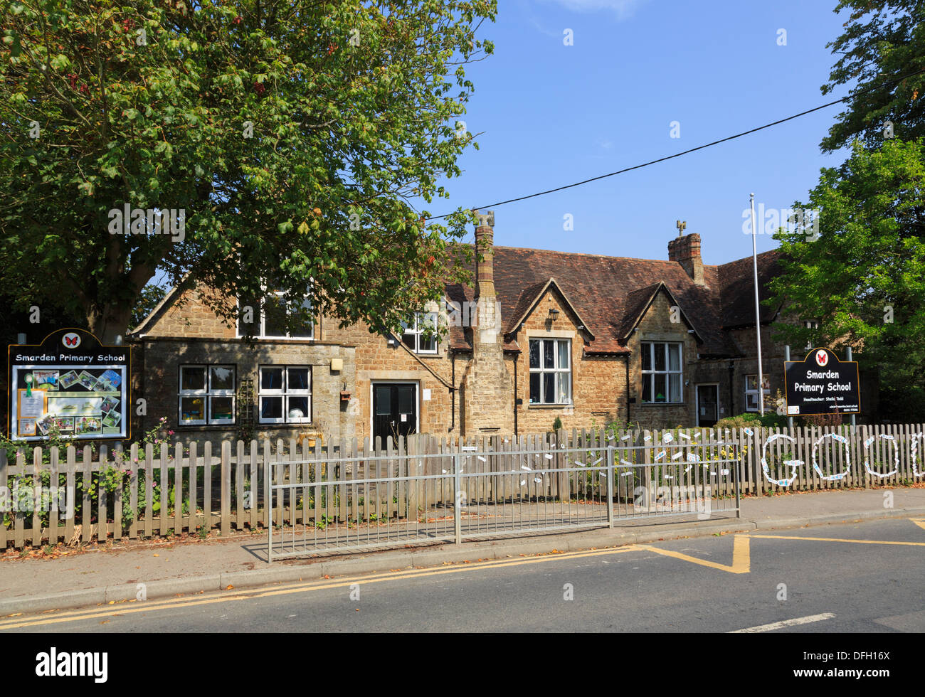 Barrier by front entrance gate to old village primary school in Smarden, Kent, England, UK, Britain Stock Photo
