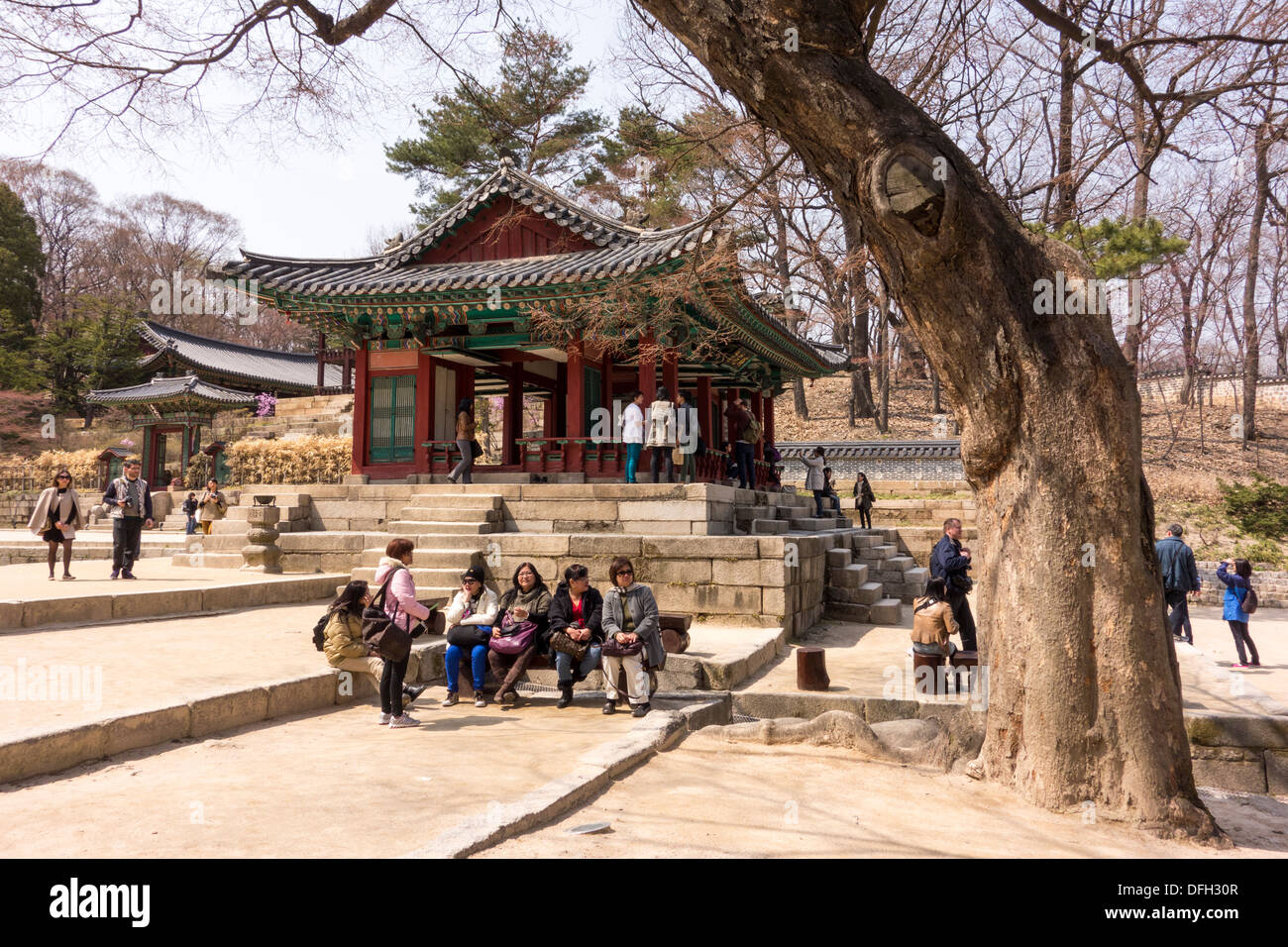 Tourists enjoying sunny day in Changdeokgung Royal Palace, Seoul, Korea Stock Photo