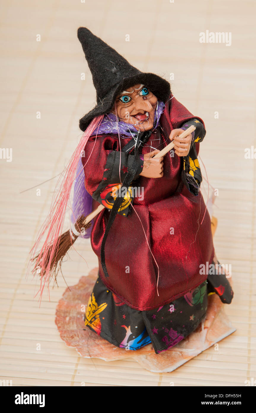 witch on a wooden background Stock Photo