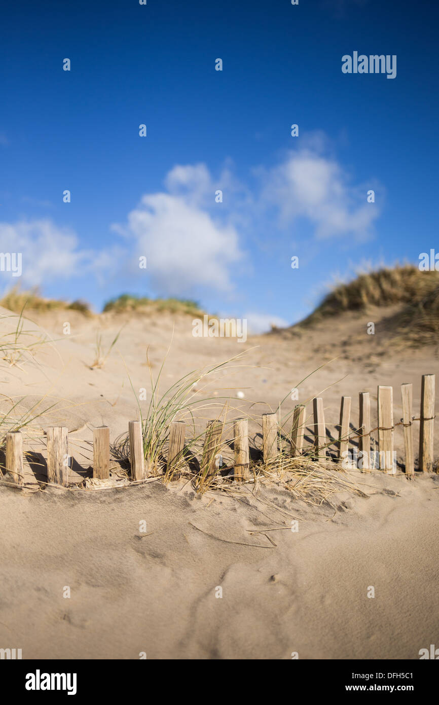 Preservation fence on sand dunes Stock Photo
