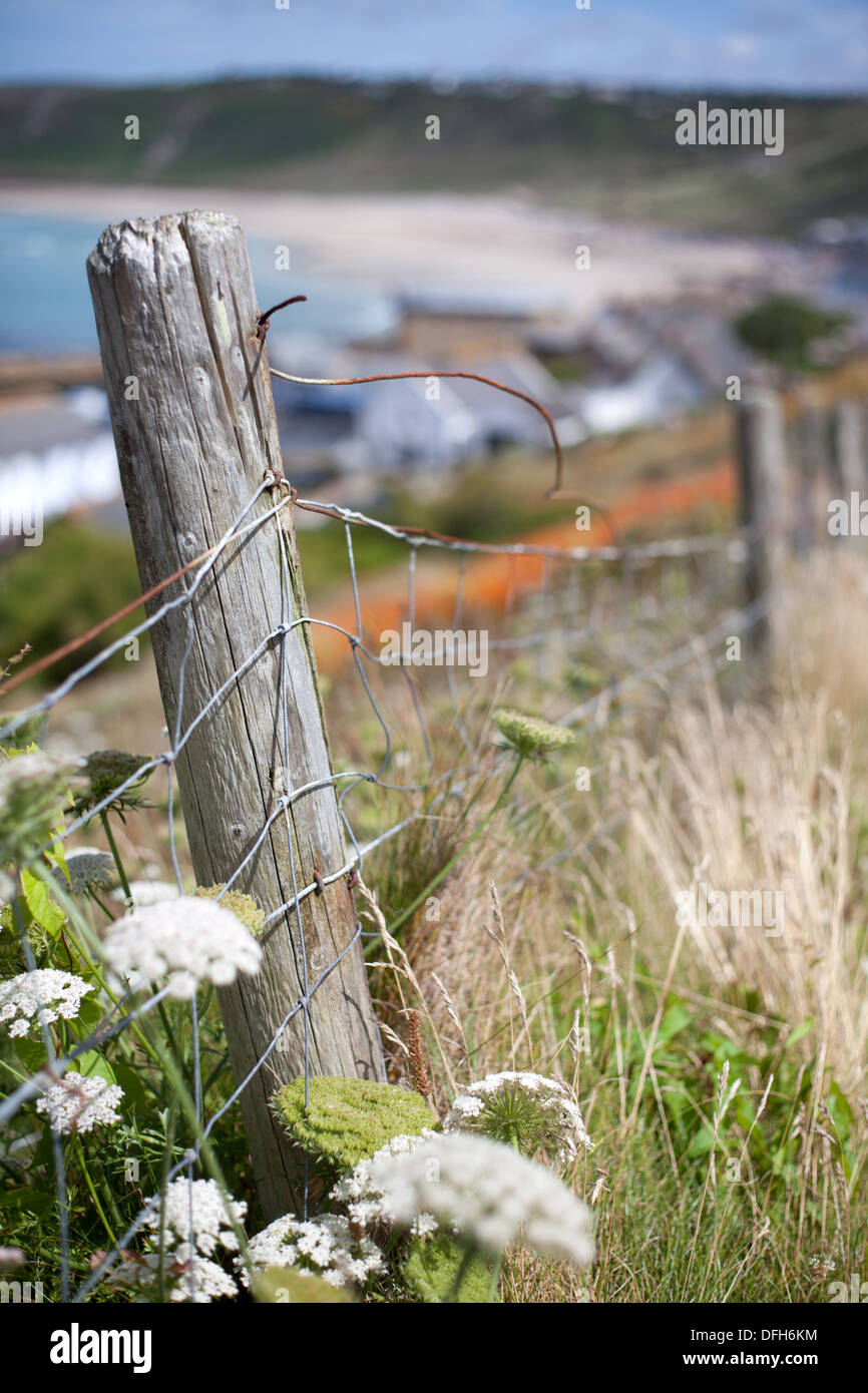 Fence post above Sennen Cove, Cornwall UK Stock Photo