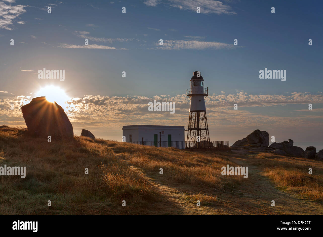 Peninnis Head lighthouse at sunrise, St Mary's, Isles of Scilly Stock Photo