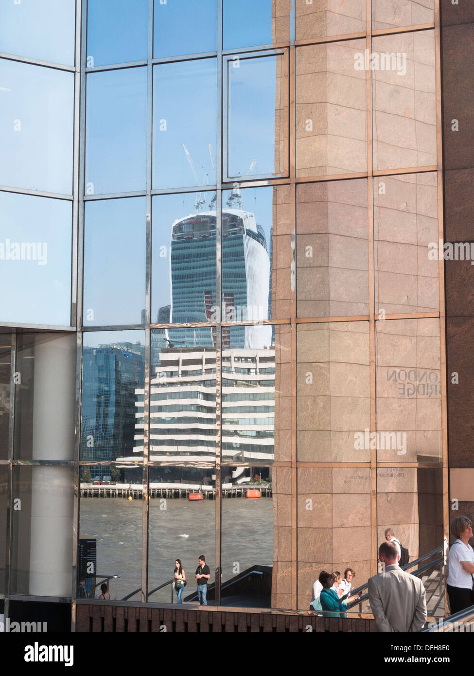 The Walkie-Talkie building under construction, reflected from a building on London Bridge, London, UK Stock Photo