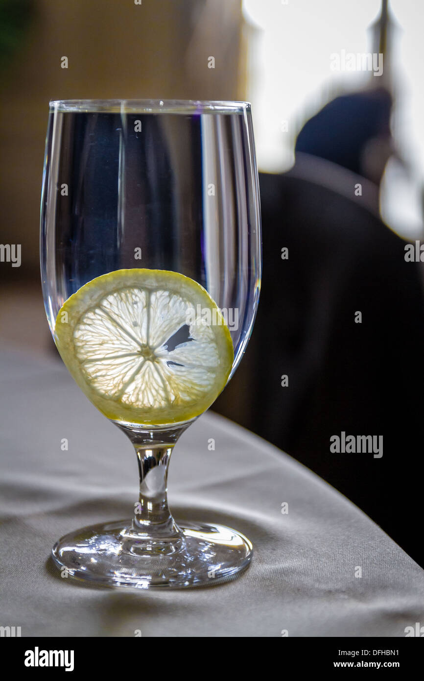 Water glass with lemon slice, side view Stock Photo