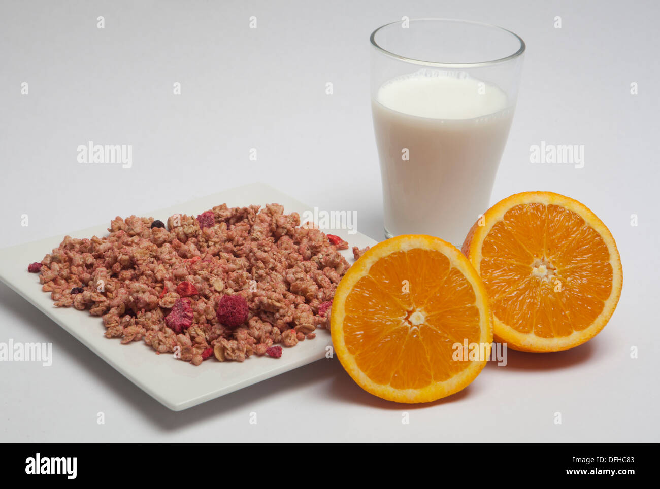 healthy breakfast consisting of oranges, milk and oranges Stock Photo