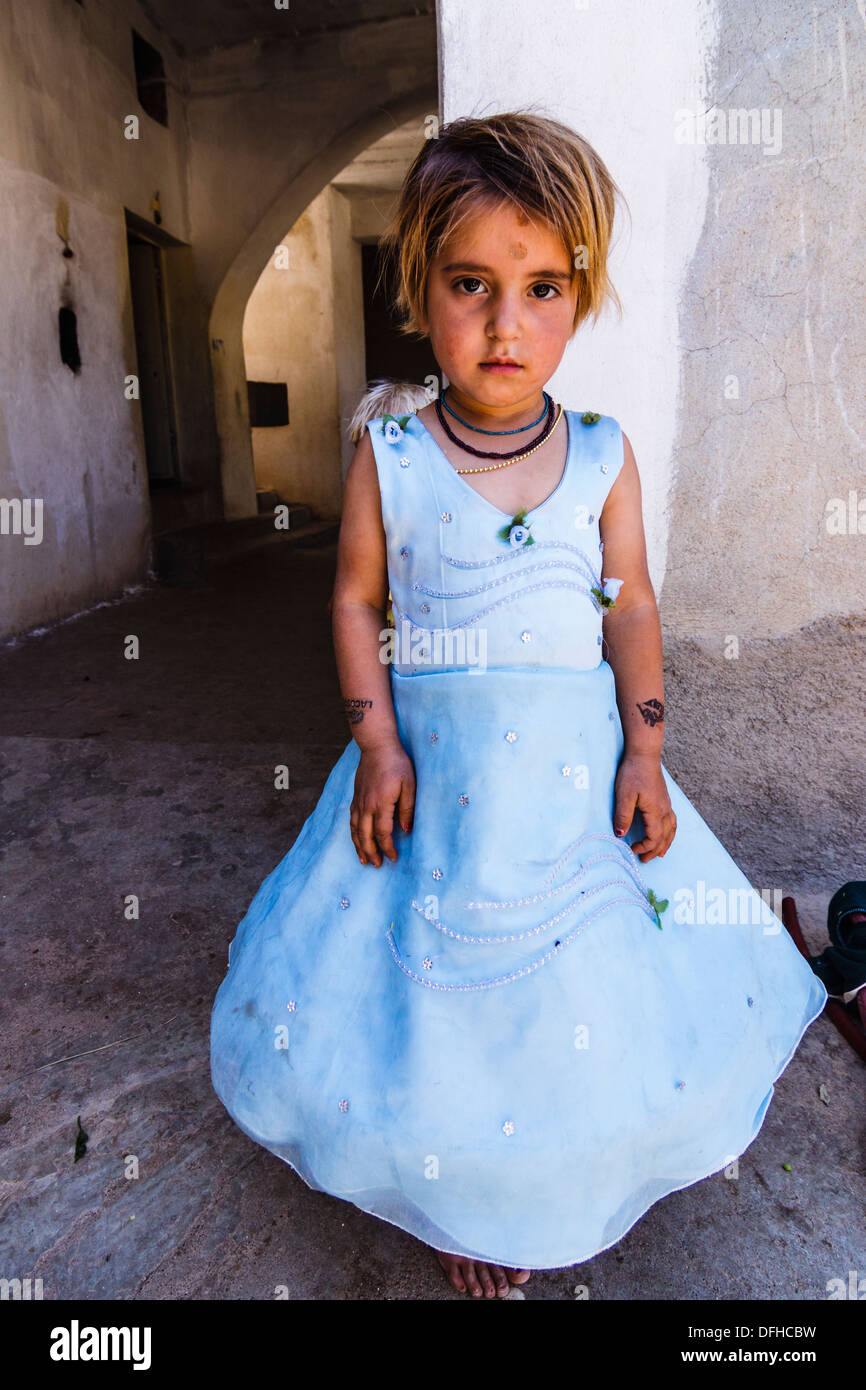 Little kurd yezidi girl wearing her best garments for the pilgrimage to Lalish . Ninawa , Iraq Stock Photo
