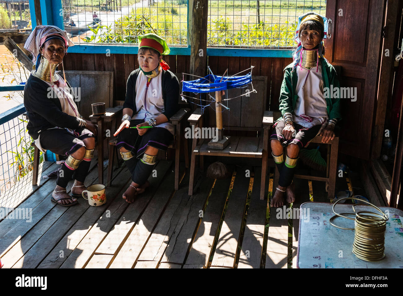 So-called Giraffe Women as tourist attraction in village at Inle Lake, Myanmar, Asia Stock Photo