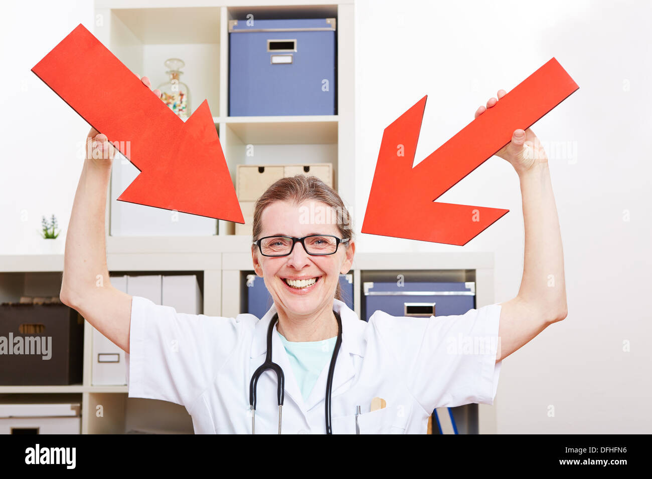 Arrows pointing woman, hospital hi-res stock photography and images - Alamy