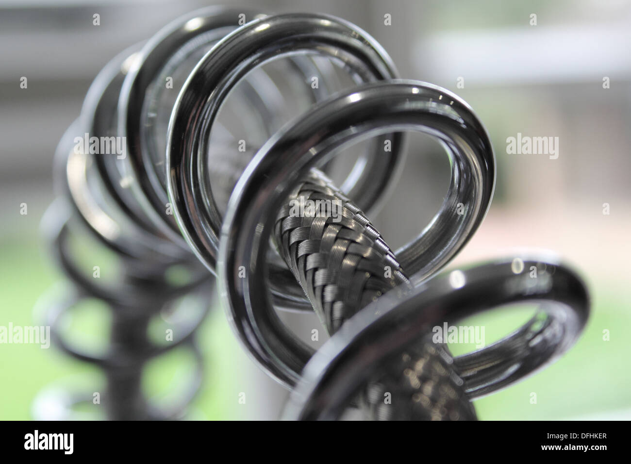 Industrial tap spring and hose Stock Photo - Alamy