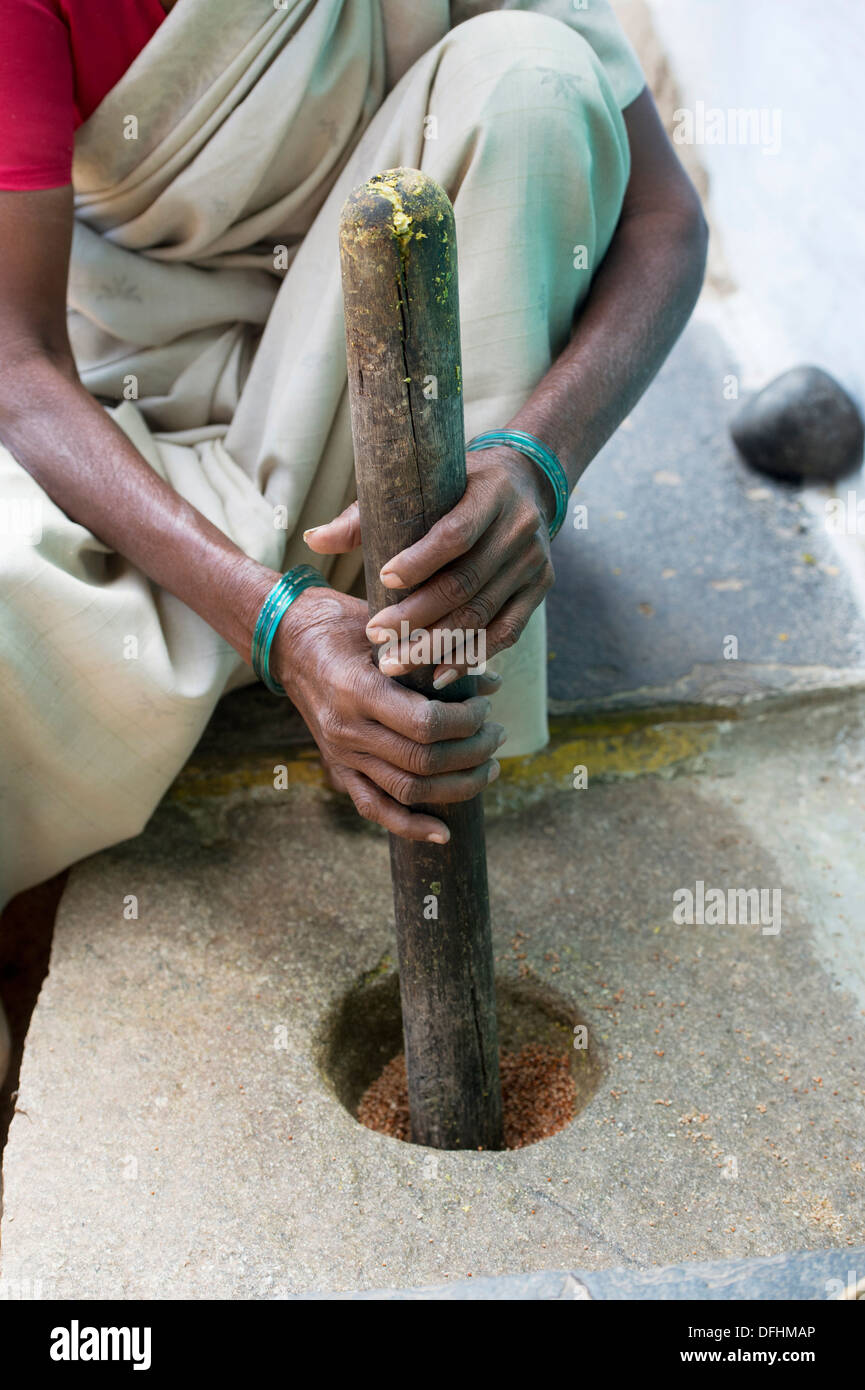 Mortar pestle village woman hires stock photography and images Alamy