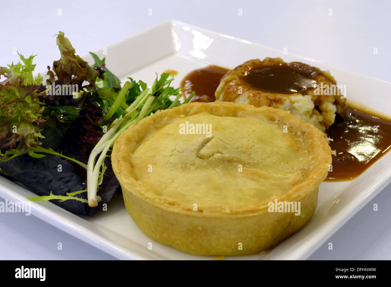 Pie with salad and mash potato Stock Photo Alamy