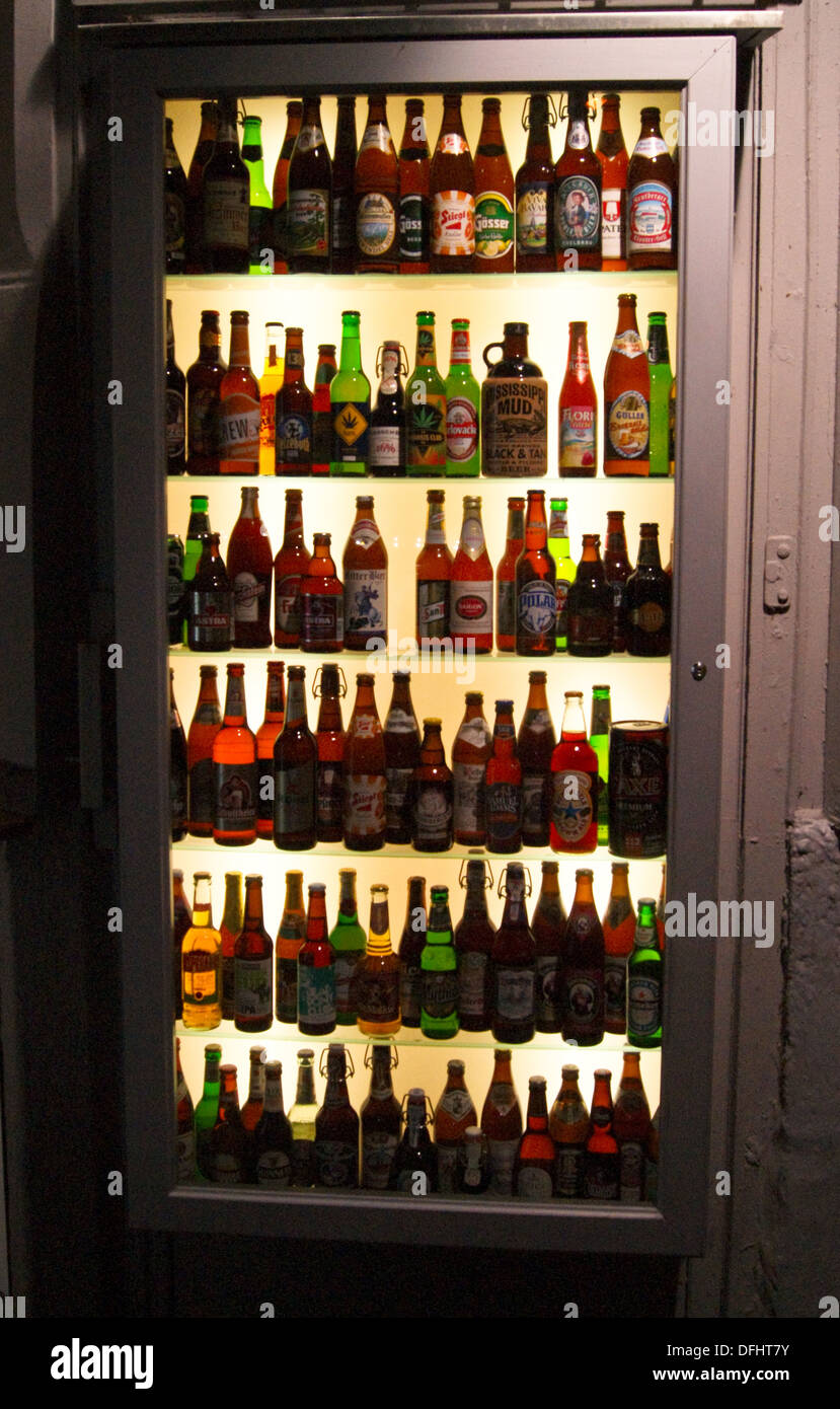 Beer bottles in a refrigerated cabinet in a street kiosk, Reichenbachbrücke, Munchen (Munich), Bayern (Bavaria), Germany Stock Photo