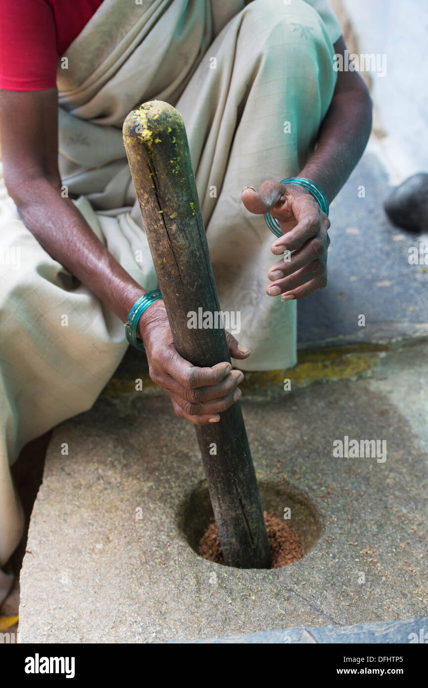 Mortar pestle village woman hires stock photography and images Alamy