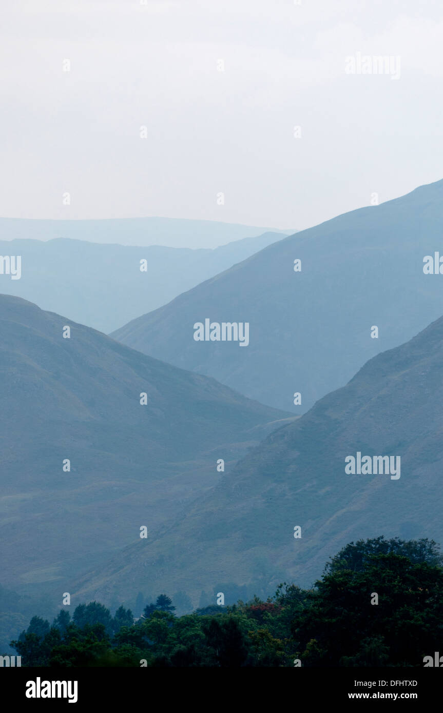 Outline silhouette of Lake District Mountains and fells in the mist Stock Photo