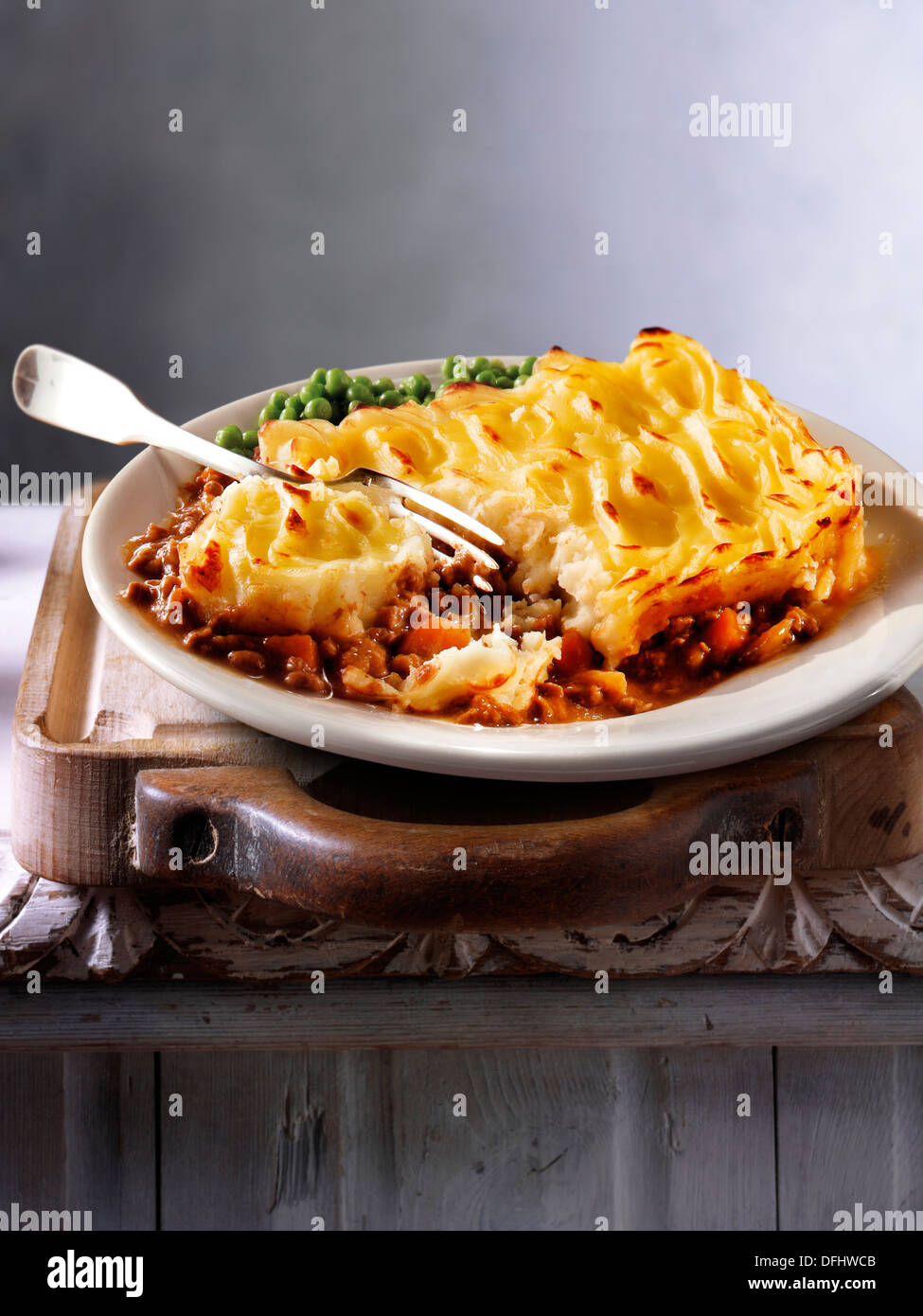 Traditional British minced beef cottage pie meal served on a plate in a