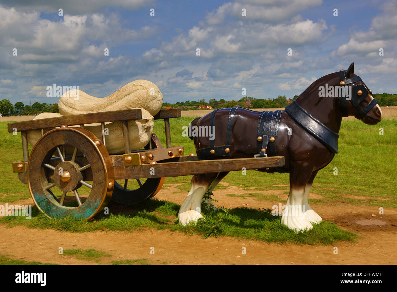 Perceval, life-sized sculpture of a shire horse pulling giant marrows. By British artist Sarah Lucas, at Snape Maltings Stock Photo