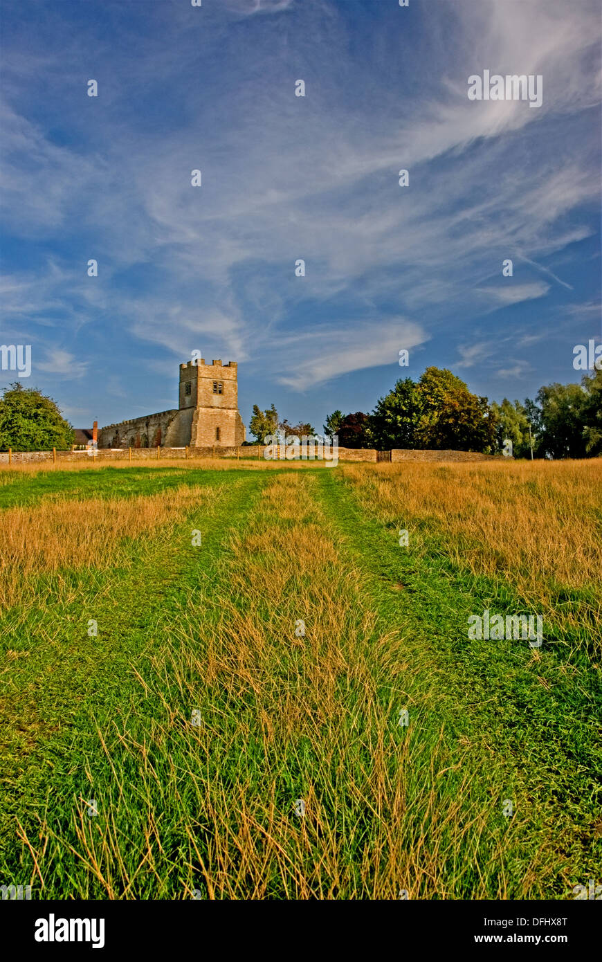 The small village church of St Giles in the small Warwickshire village of Chesterton stands on a small hillock on the edge of the village. Stock Photo