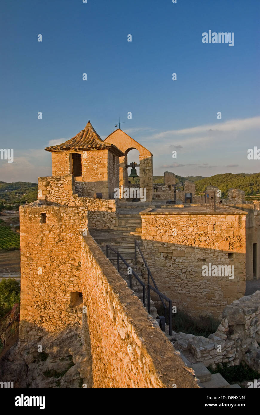 Castle of Santa Creu, in the Spanish town of Calafell, is bathed in warm evening sunshine. Stock Photo