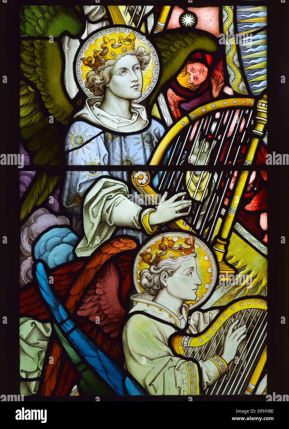 Angels with harps, detail of East window. Church of Saint Michael and All Angels. Beetham, Cumbria, England, United Kingdom. Stock Photo