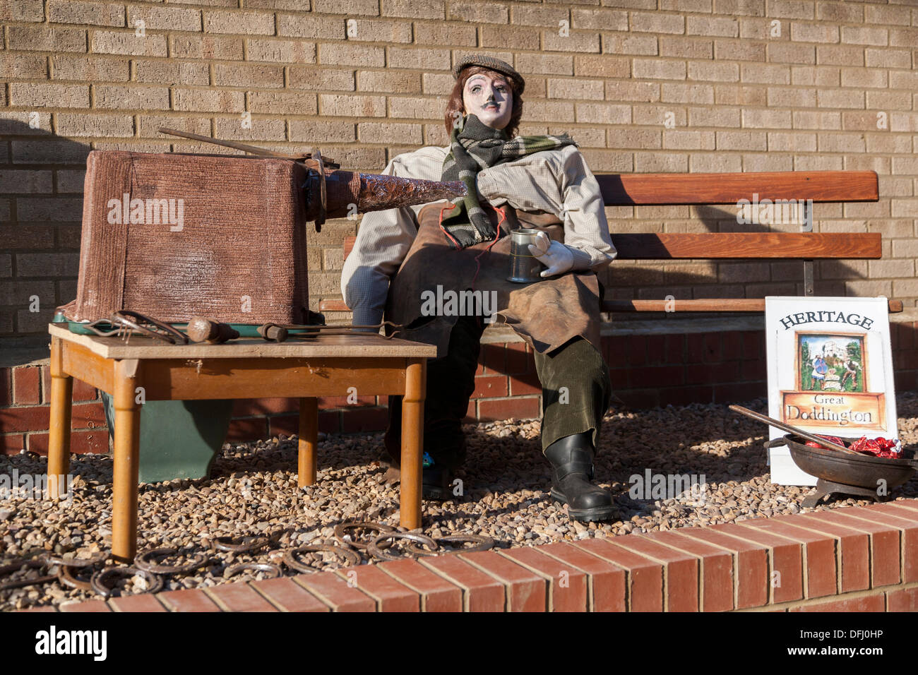 Great Doddington. Northamptonshire 5th October 2013. The Scarecrow Festival and Harvest  Celebration 5/6th October. Local residences made the scarecrows to display in the streets and front gardens of the village for this weekend Credit:  Keith J Smith./Alamy Live News Stock Photo