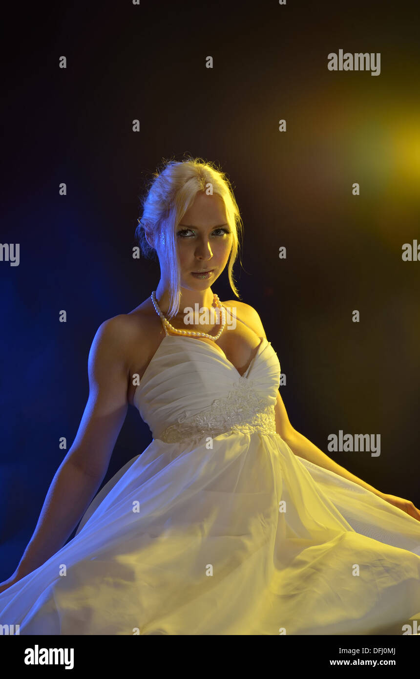Young woman in the white ball dress Stock Photo - Alamy