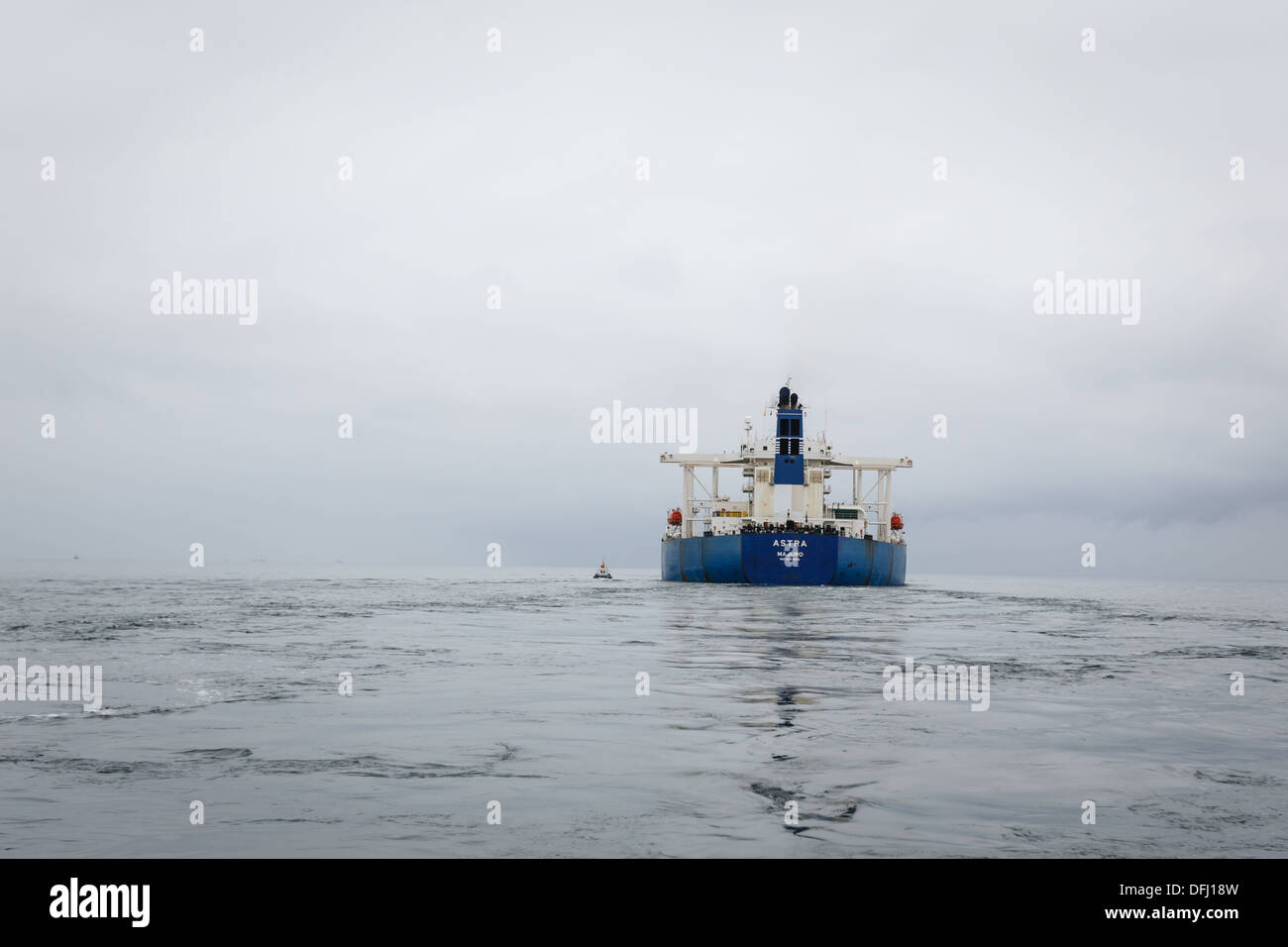 Sailing behind oil tanker on foggy morning off Catalina Island, Stock Photo