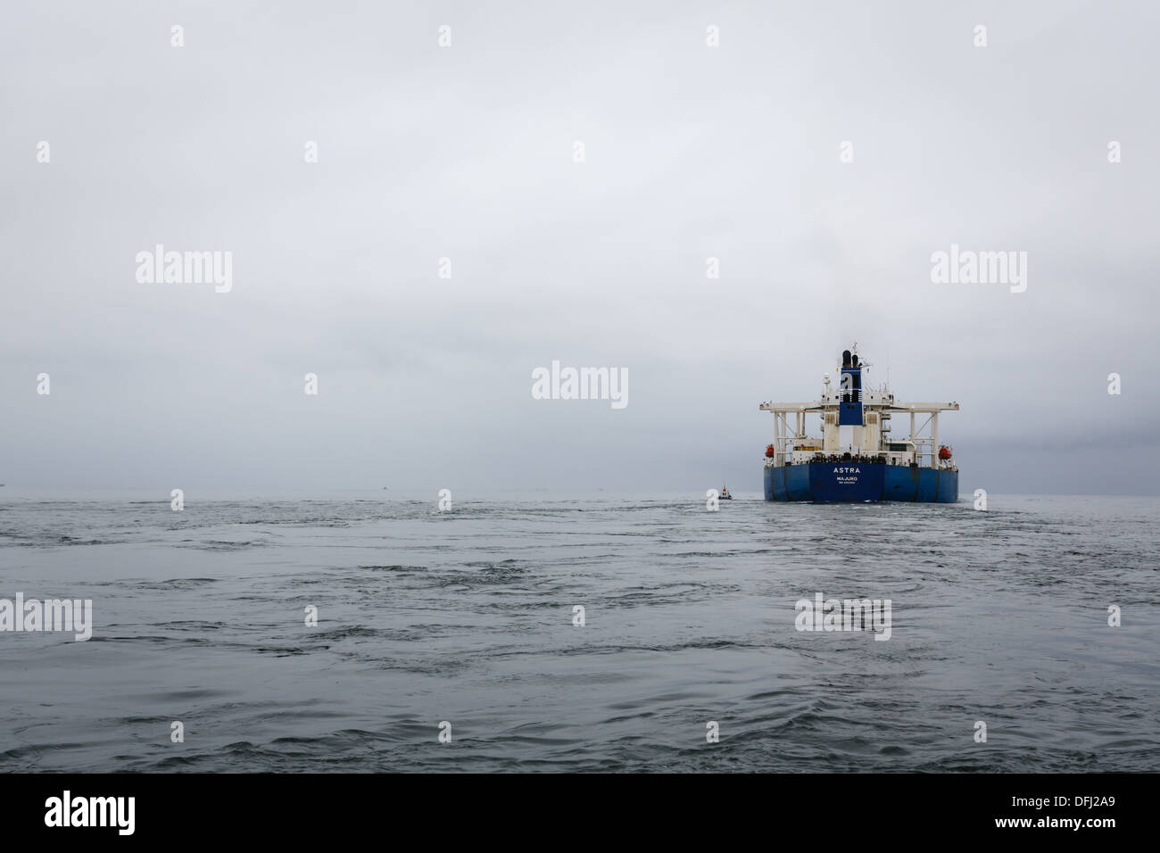Oil tanker ship sails through fog in channel off Catalina Island in