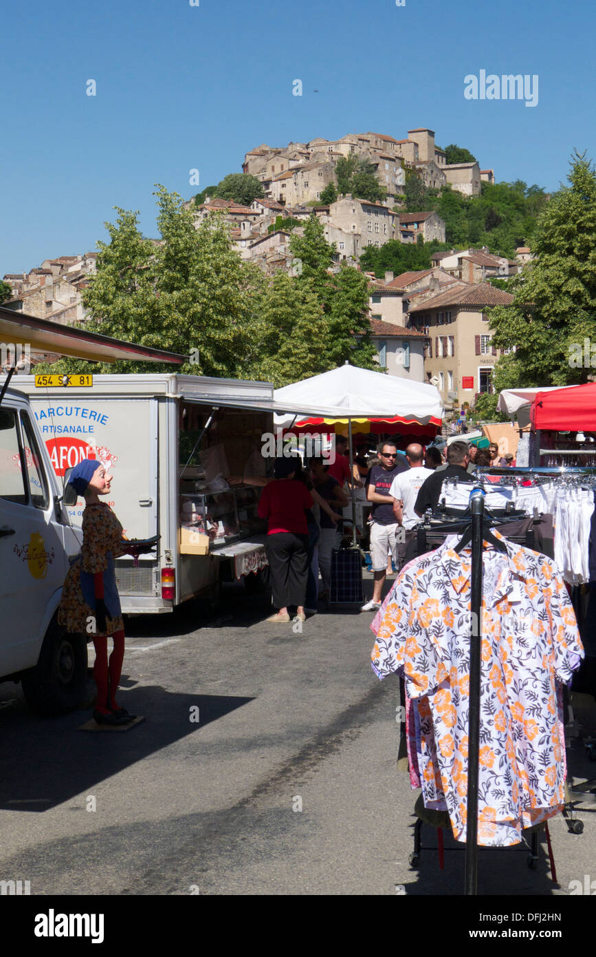 Tourists at food stall at traditional outdoor market, Cordes-sur-Ciel, France Stock Photo