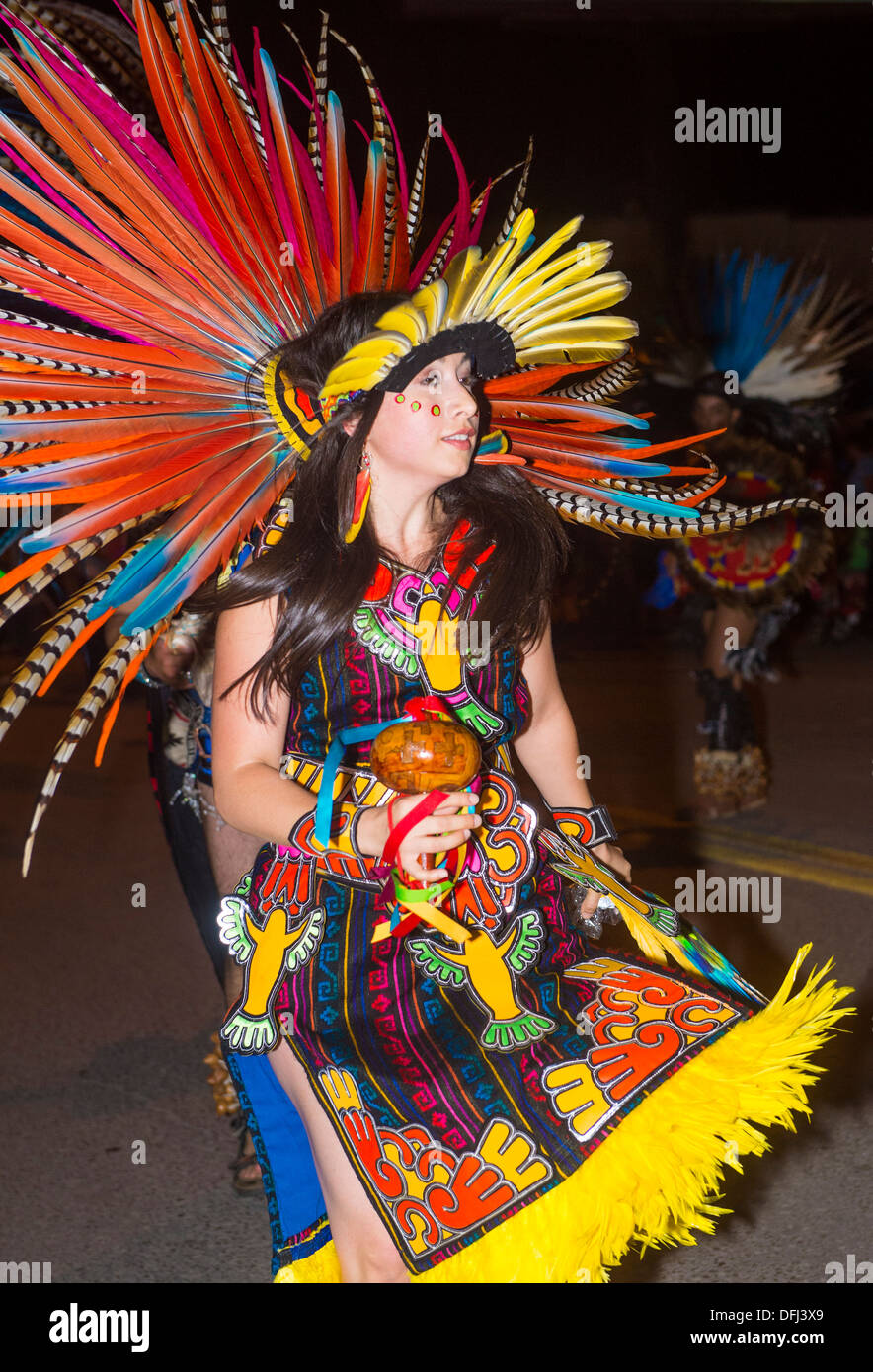 Native American with traditional costume participates at the annual