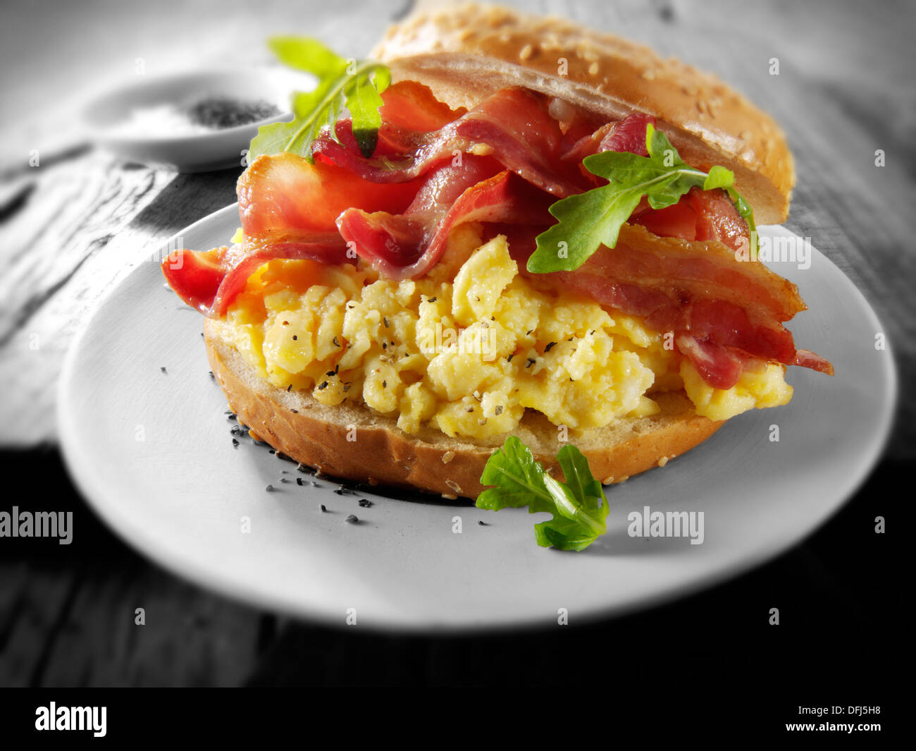 Crispy backon and scrambled eggs on a bagel Stock Photo