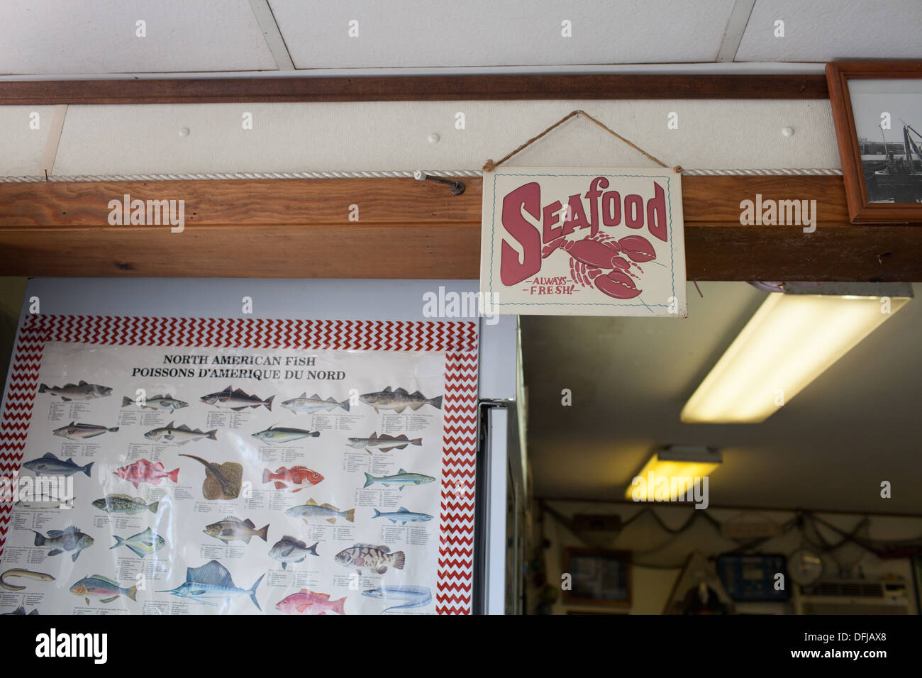 Vintage fish & seafood signs inside Sea Well Seafood in Pawcatuck, Connecticut Stock Photo