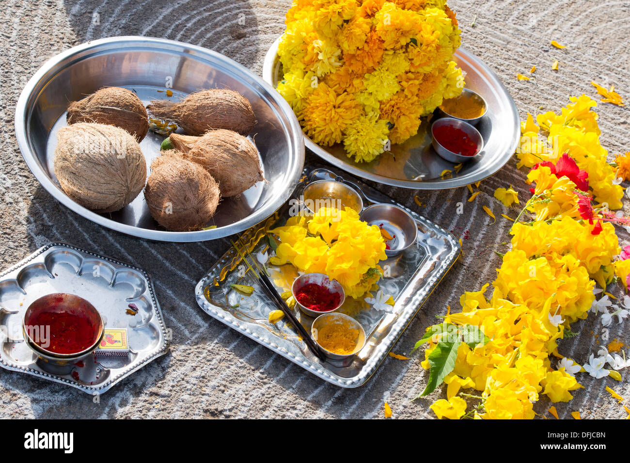 Fruits and flowers hindu puja offerings on and Indian road. Andhra Pradesh, India Stock Photo