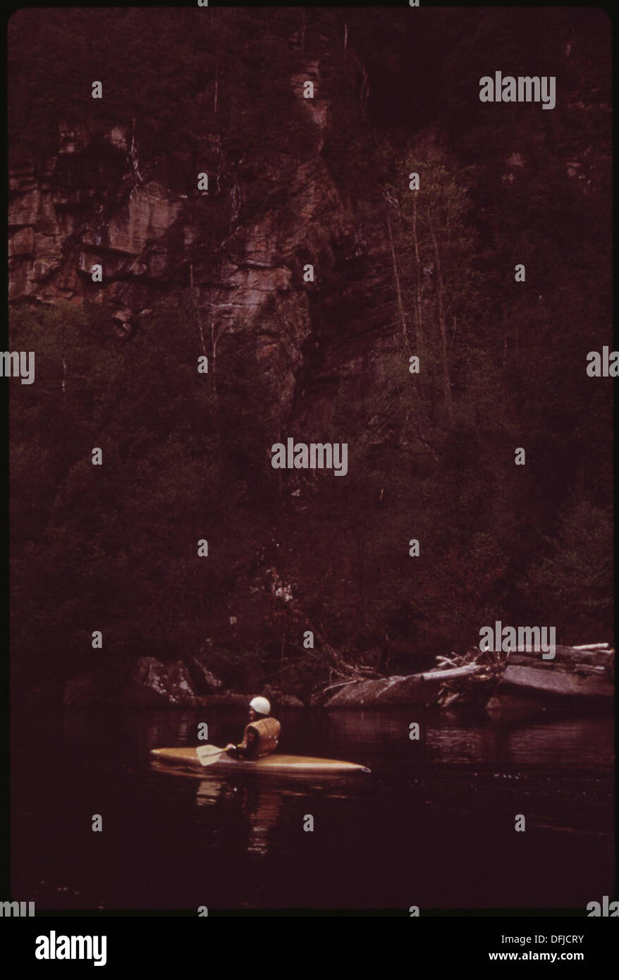 KAYAK IN STILL WATER BENEATH BLUE LEDGES ON THE UPPER HUDSON RIVER, IN