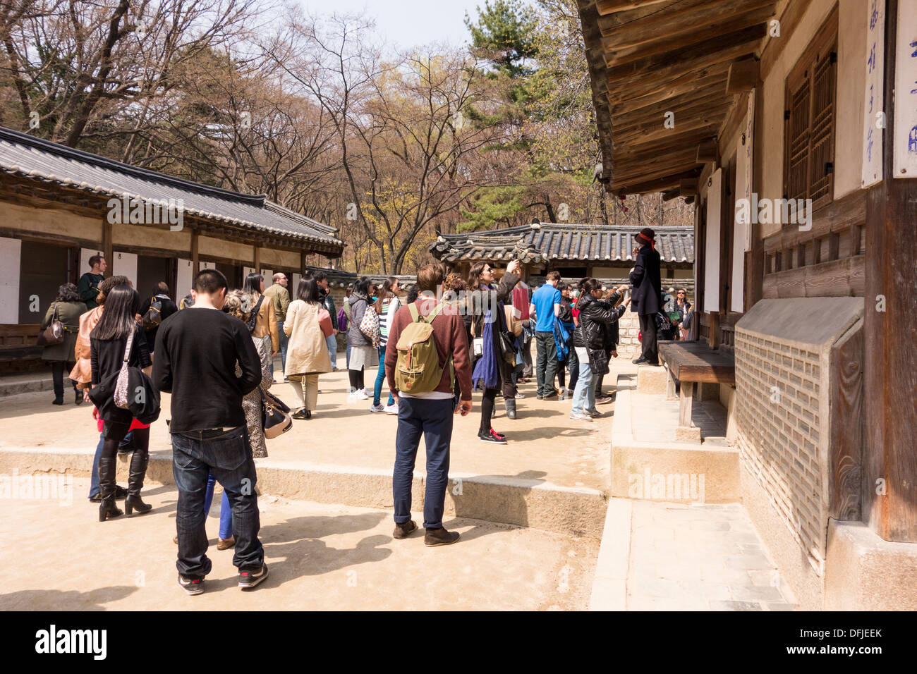 Tourists listening to Official Guide in Changdeokgung Palace, Seoul, Korea Stock Photo