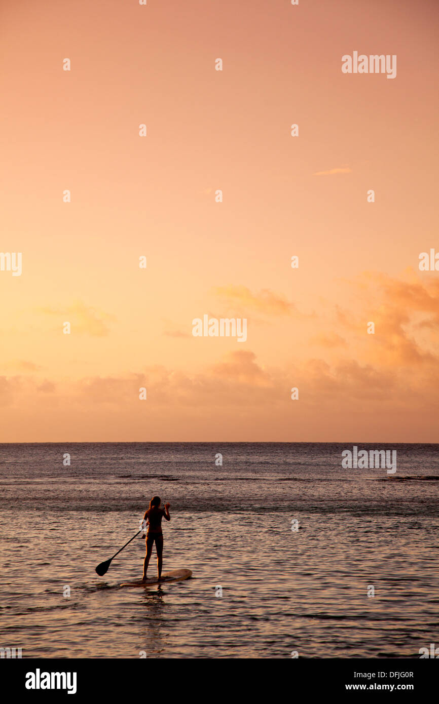 USA, Hawaii, Kauai, Kee Beach and stand-up paddle boarding Stock Photo