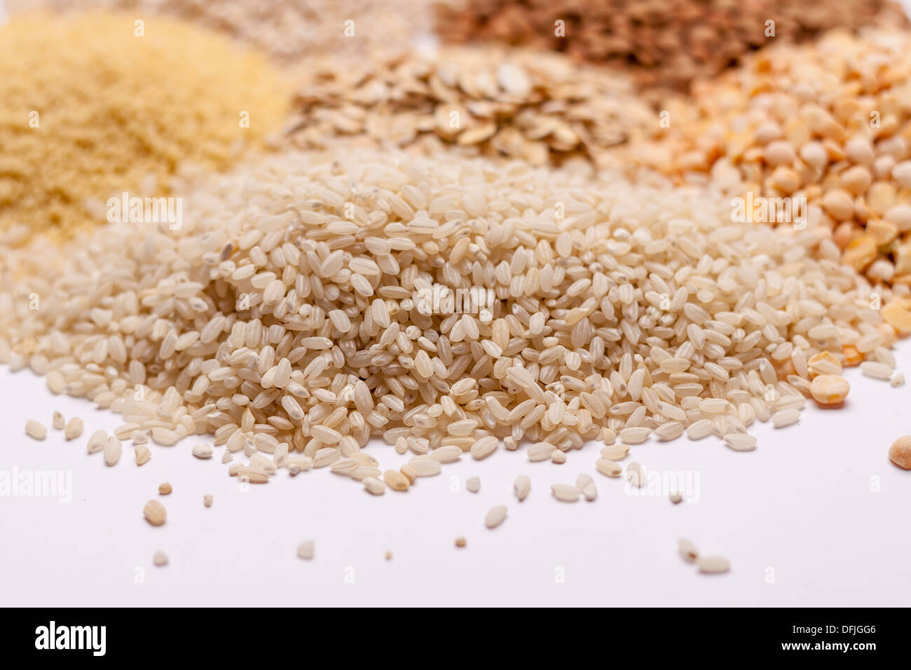 Couscous, rice, pea, grits, oatmeal, lentil white background Stock