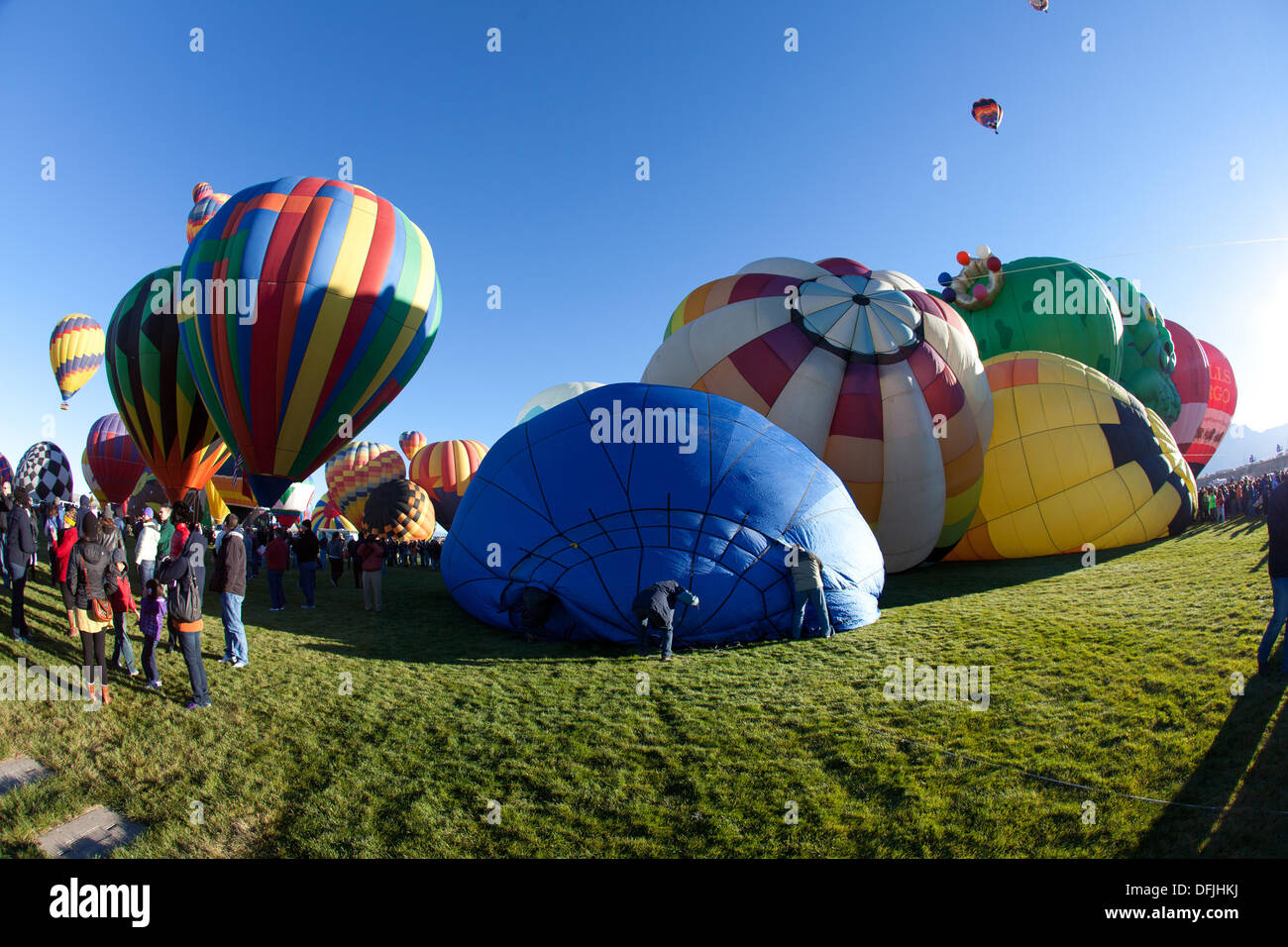 Albuquerque, NM, USA. 5th Oct, 2013. . Hot air balloons being inflated on a field, First day of mass ascension at Albuquerque International Balloon Fiesta on Saturday October 5, 2013. Albuquerque, New Mexico, USA. Credit:  Christina Kennedy/Alamy Live News Stock Photo