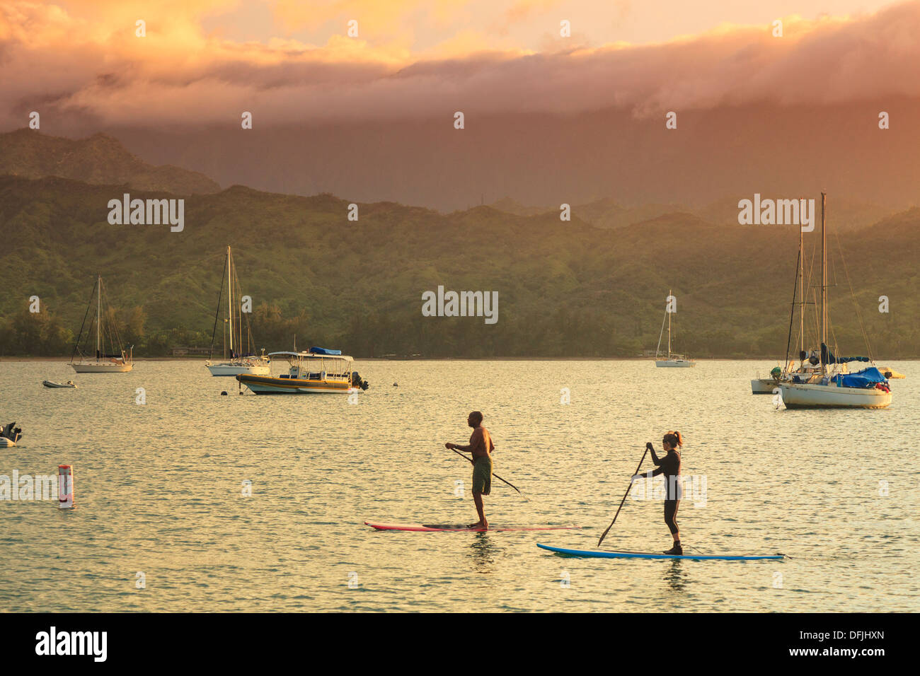 USA, Hawaii, Kauai, Hanalei Bay and Stand Up Paddler Stock Photo