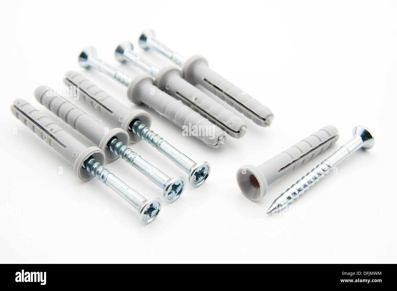 Hammer-in plastic dowels on white background Stock Photo