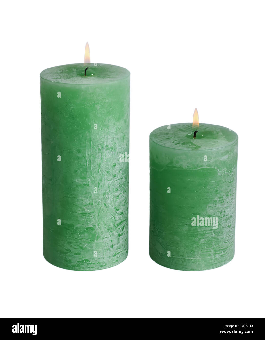 Large green burning candle.Isolated on white. Stock Photo